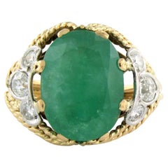 Ring with emerald 8.11ct and old mine cut diamonds 0.74ct 14k gold and platinum