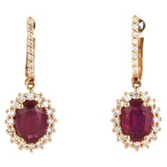 Orecchini con rubino fino a 2,90ct e diamante taglio brillante fino a 0,64ct in oro 18k