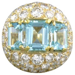 Anillo con topacio azul y diamantes talla brillante de hasta 5,30 ct Oro de 18k 13,8 gramos