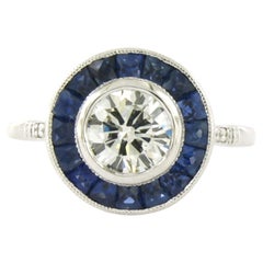 Ring with sapphire and brilliant cut diamonds up to 0.94ct 14k white gold