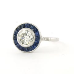 Ring with sapphire and brilliant cut diamonds up to 0.94ct 14k white gold