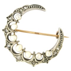 Brooch in shape of moon with pearl and rose cut diamonds 14k gold and silver