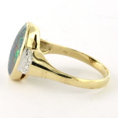 Ring with opal and single cut diamonds up to 0.05ct 14k gold 4.3 grams