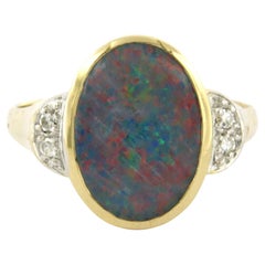 Ring with opal and single cut diamonds up to 0.05ct 14k gold 4.3 grams