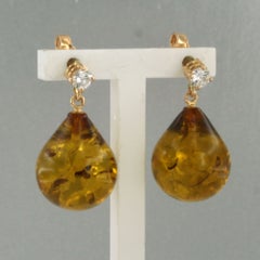 Dangle earrings with amber and brillaint cut diamonds up to 0.18ct 18k gold