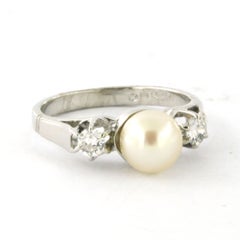 Ring with pearl and old mine cut diamonds up to 0.20ct 18k gold
