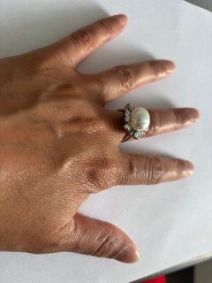 Ring with pearl, baguette and brilliant cut diamonds up to 1.00ct 18k gold