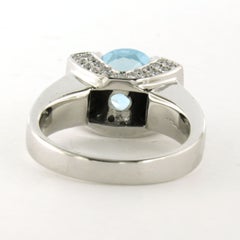 Bague avec topaze bleue et diamants taille brillant jusqu'à 0,60ct Or 14k 11,0 grammes