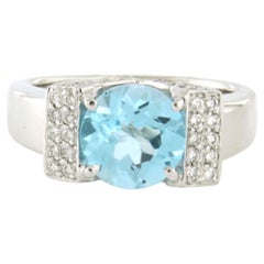 Ring with blue topaz and brilliant cut diamonds up to 0.60ct 14k gold 11.0 grams