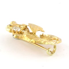 ART NOUVEAU 14k gold brooch in the shape of a griffon with ruby ​​and diamond