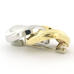 Spilla Pomellato in oro bicolore 18 carati, 14,3 grammi, design moderno