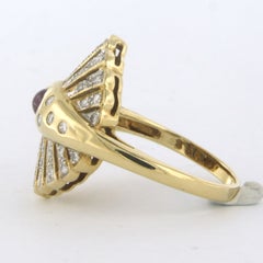 Anillo con rubí y diamantes talla brillante de hasta 0,50 ct Oro de 18k 5,6 gramos