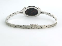 Bracelet with black opal and brilliant cut diamonds up to 0.50ct 14k gold