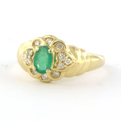 Ring with emerald and brilliant cut diamonds up to 0.20ct 18k gold 3.7 grams