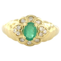 Ring with emerald and brilliant cut diamonds up to 0.20ct 18k gold 3.7 grams