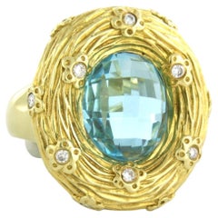 Ring with topaz and brilliant cut diamonds up to 0.22ct 18k gold 16.7 grams