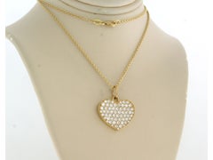 Necklace and hartshaped pendant with brilliant cut diamonds 1.50ct 18k gold