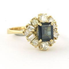 Ring with sapphire, taper and brilliant cut diamonds up to 1.00ct 18k gold