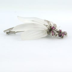 Flower brooch with rock crystal, ruby and diamonds up to 0.56ct 14k gold