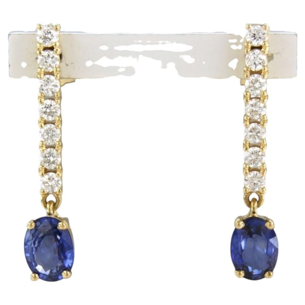 Earrings with sapphire 1.75ct and brilliant cut diamonds up to 0.54ct 18k gold
