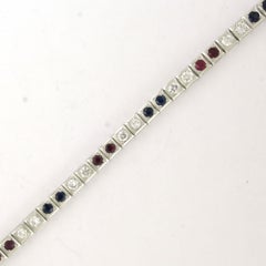 Bracelet with ruby, sapphire and brilliant cut diamonds up to 1.80ct 14k gold