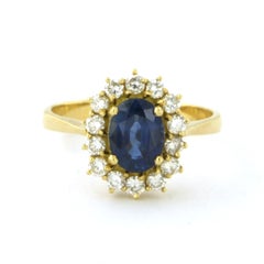 Anello con zaffiro fino a 1,90 ct e diamanti a taglio brillante fino a 0,50 ct, in oro 18 carati