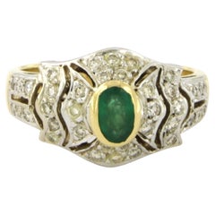 Ring with emerald and brilliant cut diamonds up to 0.20ct 18k gold 6.9 grams