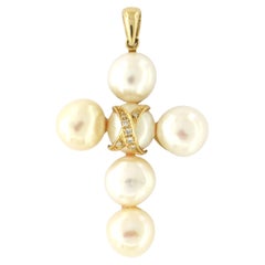 14k gold pendant shape of a cross with pearls and brilliant-cut diamonds