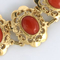 Bracelet en or jaune 14k avec Corail de taille ovale - 22,7 grammes - 19,5 cm de long
