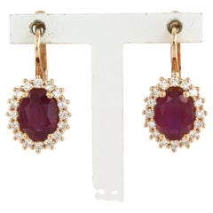 Ohrringe mit Rubin und Diamanten im Brillantschliff bis zu 0,32 Karat 18k Rotgold 5,3 Gramm