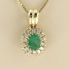 Necklace, pendant with emerald and brilliant cut diamonds up to 1.00ct 14k gold