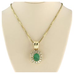 Necklace, pendant with emerald and brilliant cut diamonds up to 1.00ct 14k gold