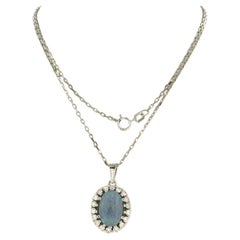 Halskette und Anhänger mit Opal und Diamanten im Brillantschliff von bis zu 0,60 Karat aus 14 Karat Gold