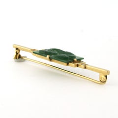 14k gold brooch with a jade carved with Chinese dragon and single cut diamonds