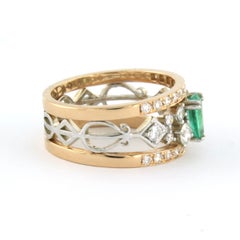 Anello con smeraldo e diamanti taglio brillante fino a 0,86 carati in oro 18 ct. 7,2 grammi