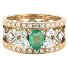 Anello con smeraldo e diamanti taglio brillante fino a 0,86 carati in oro 18 ct. 7,2 grammi