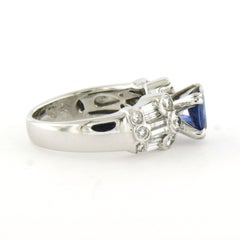 Ring with sapphire and brilliant and baguette cut diamonds u to 1.05ct 18k gold