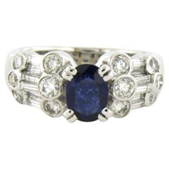 Ring with sapphire and brilliant and baguette cut diamonds u to 1.05ct 18k gold