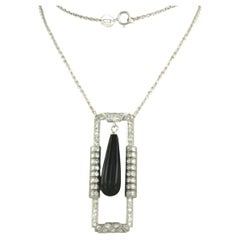 Necklace and pendant with onyx and single cut diamonds up to 1.00ct platinum
