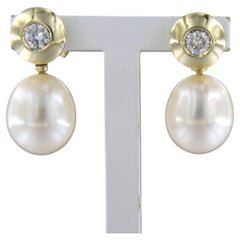Ohrringe mit Perle und Diamant im Brillantschliff sup. 0,30ct 14k Gold 6,6 Gramm