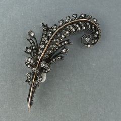 Brooch in a shape of feather with rose cut diamond up to 1.40ct 18k gold, silver