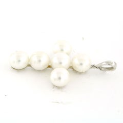 Pendant in shape of cross with pearls 18k gold 10.0 grams
