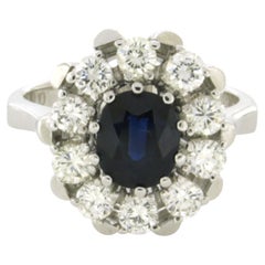 Ring mit Saphir und Diamanten im Brillantschliff bis zu 0,65 Karat, 18 Karat Gold, 7,3 Gramm