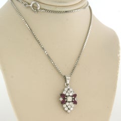 Necklace and pendant with ruby and brilliant cut diamonds up to 0.90ct 14k gold