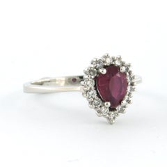 Ring with ruby up to 0.90ct and brilliant cut diamonds up to 0.24ct 18k gold