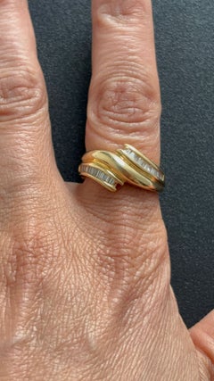 Ring with tapered cut diamonds up to 0.25ct 18k yellow gold 7.9 grams