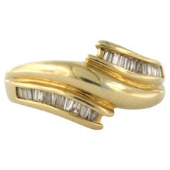 Ring with tapered cut diamonds up to 0.25ct 18k yellow gold 7.9 grams