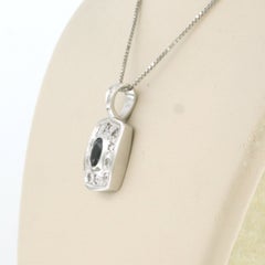Necklace and pendant with sapphire and brilliant cut diamond 18k gold