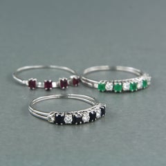 Set of five rings 18k gold with sapphire, ruby, emerald and diamonds 0.50ct