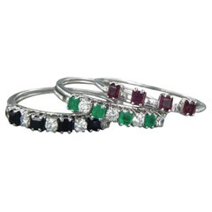 Set of five rings 18k gold with sapphire, ruby, emerald and diamonds 0.50ct